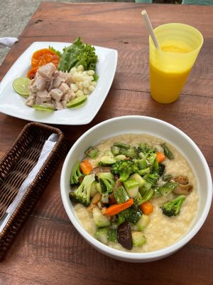 Vegan risotto, juice, ceviche (not vegan)  at Banana's Adventure Hostel in Huacachina