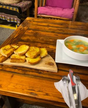 Vegetable soup and garlic bread (huge portion)  at Banana's Adventure Hostel in Huacachina
