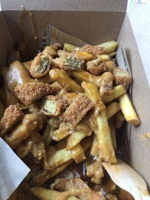 Motherclucker  cheesy fries with chicken nugget bits  at Le Pub in Newport