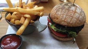 Vegan burger and chips. Delicious for breakfast! Big enough to share.  at Red Bean Coffee Roasters in Preston