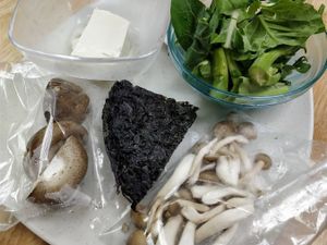 raw ingredients for steamboat. $1 each  at Yuan Lai - Organic Veg Mini Hot Pot in Central Singapore