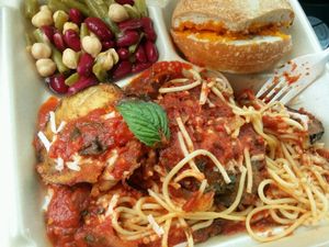 Eggplant park, 3 bean salad and cheesy bread. at The Reizod Vegan Experience in Columbia