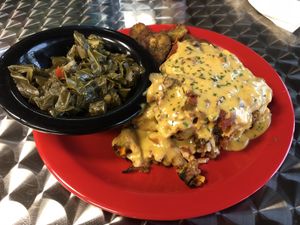 Experience pasta and collard greens  at The Reizod Vegan Experience in Columbia