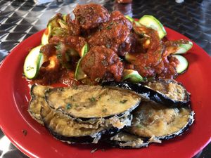 Spaghetti and meatballs w/ zucchini noodles and fried eggplant  at The Reizod Vegan Experience in Columbia