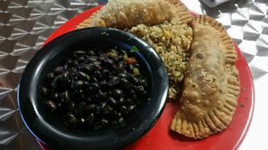 Empanadas with rice and beans at The Reizod Vegan Experience in Columbia