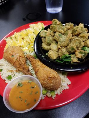 Fried "Chiken Drumstiks" on a bed of rice with a sweet spicy sauce, fried okra and Mac & Cheez bowties! at The Reizod Vegan Experience in Columbia