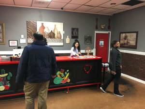 Inside the restaurant, at the register at The Reizod Vegan Experience in Columbia