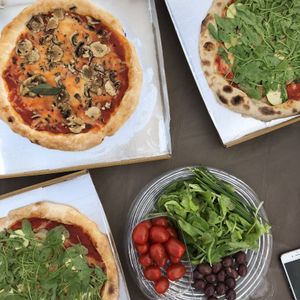 One funghi and two vegetariana pizzas with vegan mozzarella!  at Mister Pizza - Duomo in Florence