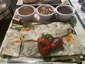 Chaya tamales (vegan)! at Iguana Juan's in San Pedro