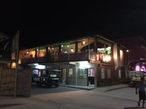 Conveniently located upstairs of an old building, on a back street, on an island, in Central America. COME FIND US - You will be glad that you did! at Iguana Juan's in San Pedro