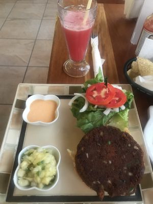 Vegan black bean burger with water melon water (ask to NOT add sugar)  at Iguana Juan's in San Pedro