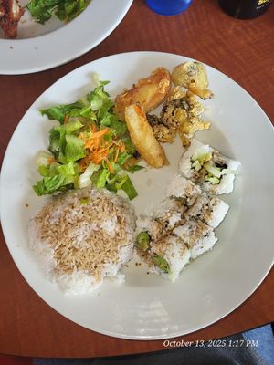 Lunch special, rice, tempura vegetables, and cucumber and avocado rolls, salad. at Blufin Sushi in Fresno