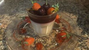 Vegan dessert.  Home made Panna Cotta with fruis sauce.
Postre vegano.  Panna Cotta Casera con salsa de frutas. at La Taberna Farfalla in Carboneras