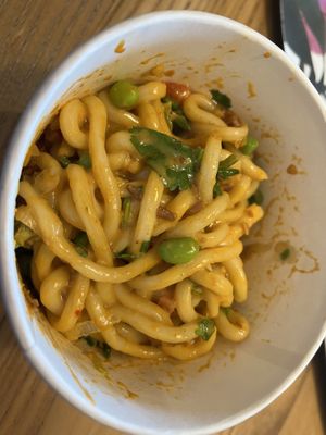 Korean style stir fry udon noodles  at Itsu - Wimbledon in South West London