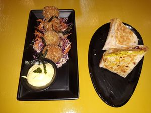 Vegan cheeseballs and breakfast sandwich at Nourish Cafe in Bangkok