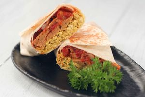 Breakfast Wrap with vegan sausage, beans in bbq sauce and scrambled tofu at Nourish Cafe in Bangkok