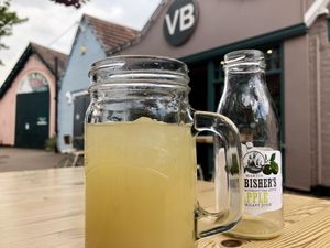 Apple juice & front of restaurant at Vutie Beets in Letchworth