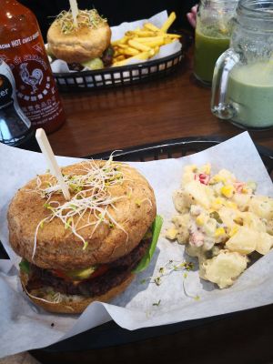 Bean and beet burger with potato salad and chips. Green kick juice with peanut butter smoothie  at Vutie Beets in Letchworth