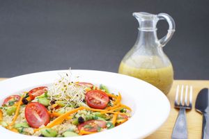 Fresh quinoa salad with carrots, cherry tomato, edamame, zucchini noodles, sprouts, and an apple cider vinaigrette. at GreenHut - Food Truck in Squamish