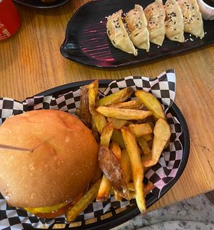 Vegan cheese burger and gyozas   at Kino in Barcelona