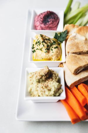 Hummus (classic, beet and broccoli) at Kino in Barcelona