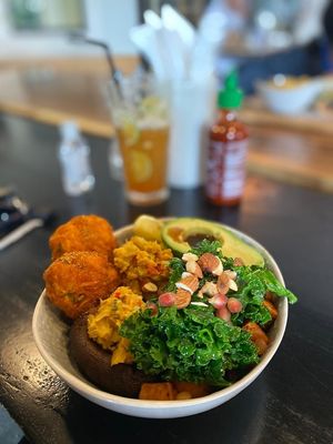 Veggie Wonderland: sweet potato hash browns, portobello mushroom with chickpeas, kale salad and avocado at Amongst Few in Dubai