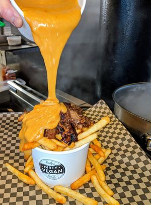 Pulled jack fruit loaded on top if fries and gooey cheese at Rudy's Dirty Vegan Diner in North West London