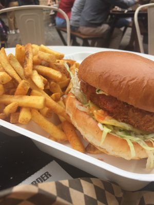 Buffalo Burger with a side of fries! at Rudy's Dirty Vegan Diner in North West London