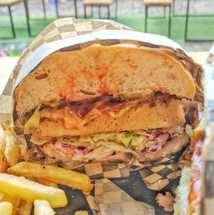 Close up of sabateaur burger  at Rudy's Dirty Vegan Diner in North West London