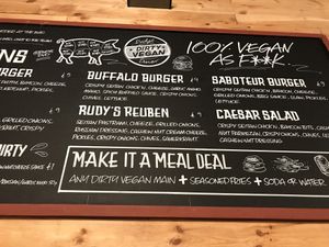 Menu board at Rudy's Dirty Vegan Diner in North West London