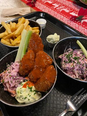 Buffalo wings, coleslaw and fries at Rudy's Dirty Vegan Diner in North West London