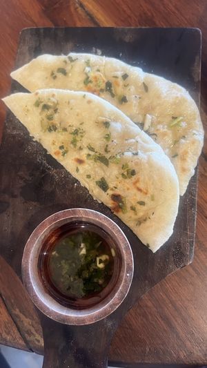 Flat bread with herb/garlic oil  at Pituq Cafe in 