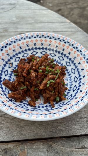 Sweet and spicy tempeh  at Pituq Cafe in 