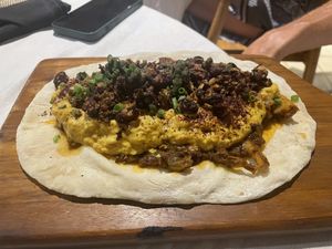 Dal and flat bread  at Pituq Cafe in 