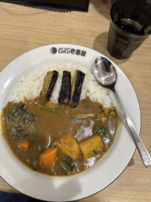 Less rice with half portions eggplant, spinach and vegetables   at Coco Ichibanya - Chuoku in Osaka