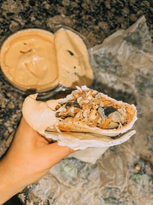 Take home burrito with just sautéd veggies I dipped it in plant based queso! at Red Mesa Mercado in St Petersburg