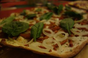 G2 Vegan Alsace (with vegan cream, vegan, bacon, and onions) with extra spinach at Flammerie Alt-Saarbrücken in Saarbrucken