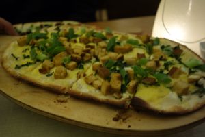 Classic tarte flambée (vegan) at Flammerie Alt-Saarbrücken in Saarbrucken