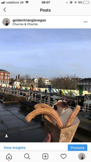 Eat whilst looking at Norwich market :) at Churros for the People in Norwich