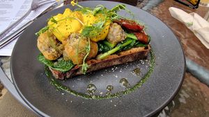 Vegan Benedict.  Sourdough toast, miso tempura mushrooms, spinach, vegan bacon and Birdhouses hollandaise sauce.. SO GOOD!! at Birdhouse in Sheffield