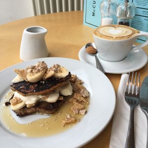 Vegan oat and banana pancakes with whipped sweet tahini, banana and maple syrup at McCune Smith Cafe in Glasgow