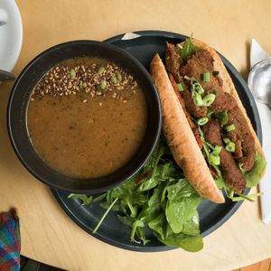 roasted cauliflower soup with a vegan spicy sausage sub at McCune Smith Cafe in Glasgow