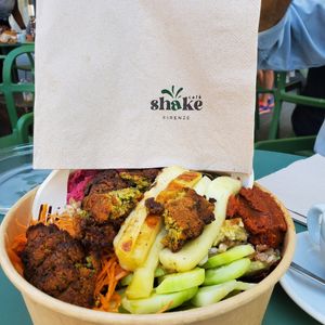 Falafel bowl. I think the cheese things were real cheese and took them off. I asked for vegan. Some places do use vegan cheese but didn't have time to ask. at Shake Cafe - Camillo Cavour in Florence
