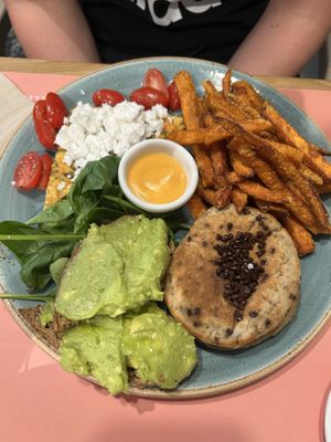 Vegan brunch plate: chickpea omelette, vegan feta cheese and cherry tomatoes / avocado toast and sweet potato fries with harissa mayo / vegan chocolate chip and banana pancakes  at Shake Cafe - Camillo Cavour in Florence