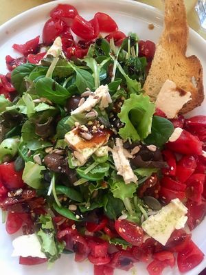 Greek salad with homemade vegan cheese at Fiumefreddo Bio in Venice