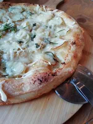 garlic potato pizza with vegan cheese at Grano in Manchester