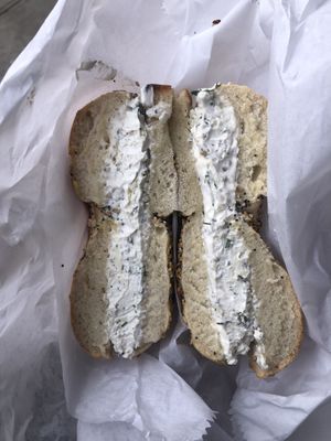 Garlic and herb tofu spread with everything bagel  at Tompkins Square Bagels in New York City