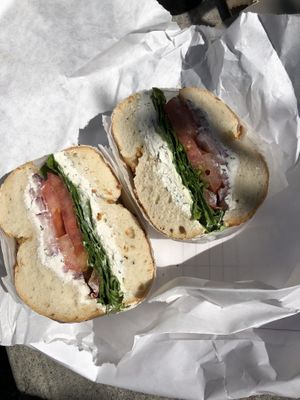 Onion bagel, garlic and herb spread, lettuce tomato and red onion. Best combo   at Tompkins Square Bagels in New York City