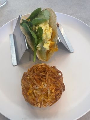 breakfast taco & potato breakfast item  at Boulevard of Greens in Fort Worth