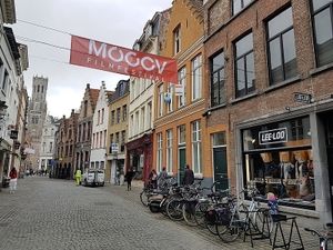 front of shop, Belfry in the back at Leeloo Bvba in Bruges